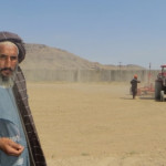 Juma Khan, a farmer in Panjwayi, with his newly bought tractor.