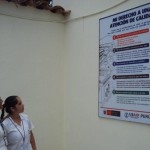Poster informing patients of their right to quality care at the entrance of the Lluyllucucha health center.