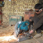 A worker at Maroof Metal works on a window frame using the new equipment 