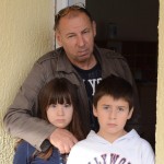 Bozo Ninkovic from Samac with his son and one daughter. They lost everything when their home was under 10 feet of water. 