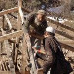 Master builders in the Chatterplain region of Mansera District train local villagers how to con-struct earthquake resistant tran