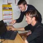 University of Prishtina students Fatmir Halili and Islam Pepaj looking at the university's new web site