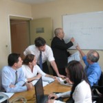 Technical staff review audit findings related to possible corruption charges in Paraguay.