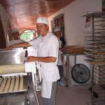 Dwilliam Norberto Toloza, a commercial baker, at work