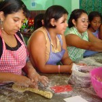 Young students learning to cook at an outreach center in Guatemala