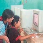 Mayan children and teachers use computers to learn and build self-esteem 