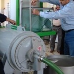 Al-Zaytoon Olive Association members in Ninawa install new olive processing equipment provided by USAID-Inma.