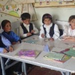 Children at Yazgulam's School No. 22 enjoy interactive lessons, part of innovative changes suggested by a USAID education initia
