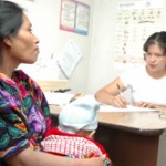 A Guatemalan indigenous woman discusses options with a family planning counselor at a Ministry of Health facility in Chichicaste
