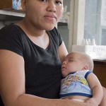Residents, such as this woman with her child, are now more likely to come to the San Lorenzo health center in Nicaragua