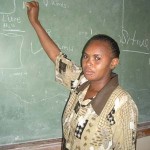 Nursing teacher Winfrida Kwesha lectures at the Kasama School of Nursing, which provides an incentive package to support them. 