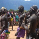 Residents of Kapoeta, Eastern Equatoria, do a traditional peace dance at a rally where the peace agreement text was distributed.