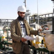 Bilel Boutadjine, an engineer and former University of Mentouri Constantine (UMC) student, is pictured at his job at KIS Co. Bil