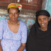 Yeshi Alem, left, educates her village about the perils of making girls marry young. She is seen here with one of the women she 