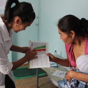 Medical staff consulting young moms on nutrition