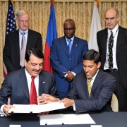 USAID Administrator Rajiv Shah (right) and Mohamed Bin Abdulla Al-Rumaihi, Qatari Ambassador to the United States and chairman f