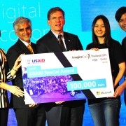 U.S. Embassy Chargé d’affaires W. Patrick Murphy, center, presents USAID Special Award to team Len for its innovate app to provi