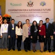 A country delegation and U.S. officials at the LMI Alumni Conference in Hanoi.