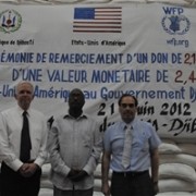 Officials gather in Djibouti to mark the food aid ceremony.