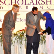 A student beneficiary while receiving her scholarship
