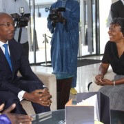 USAID Deputy Director Alfreda Brewer chats with Senegal’s Prime Minister Abdoul Mbaye before the anti-corruption workshop.