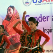 Photo of local girls' dance troupe in Rangpur, Bangladesh performing at gender and development fair.