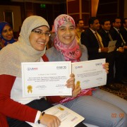 Two of the engineers who interned with EGEC proudly display their certificates of completion.