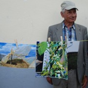 A farmer from Pchinja follows the discussion with the agriculture experts on climate change 