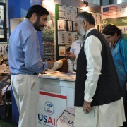 Visitors taking intrest in the USAID projects at the Agriculture Expo
