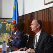 Richard Kimball (right), deputy director of USAID/DRC's Democracy, Human Rights and Governance office, makes opening remarks