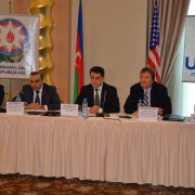 The chairman of the NGO Council presents the draft law to the participants