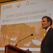 USAID Mission Director addresses the conference emphasizing the importance of the dialogue between government and civil society