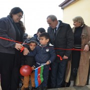 Children join the opening of the renovated kindergarten in Cholbeshadli, Sabirabad.