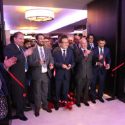 U.S. Ambassador P. Michael McKinley and Afghan officials cut ribbon to open the premier Exhibition Afghanistan, Dubai.