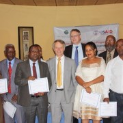 New grantees pose with USAID Ethiopia Mission Director Dennis Weller (center front) and CNFA Chief of Party Marc Steen.