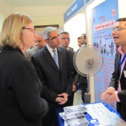 USAID Mission Director Dr. Mary C. Ott engages in discussions with employers as they tour the job fair.