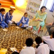 Mission Director John Groarke visited a school in Islamabad and read books with students. 