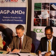 USAID Mission Director Dennis Weller and Ethiopia Commodity Exchange CEO Ateneh Assefa at the signing of a memorandum of underst