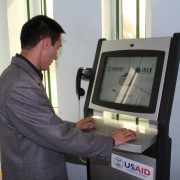 A community member connects to the virtual world through an internet kiosk