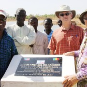 Mission Director Patrick and Minister of the Environment El Ali pose by the inaugural plaque