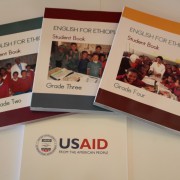 Three of the 5.5 million English language textbooks, developed and published with USAID assistance, for students