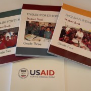 Three of the 5.5 million English language textbooks, developed and published with USAID assistance.