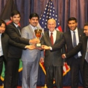 Students from American University of Afghanistan pose for a photo with the US Ambassador, Michael McKinley (center)