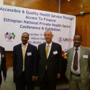 USAID’s Gary Linden and Siana Tackett join Abduljelil Reshad, Mulugeta Asmara, and a NIB bank representative.