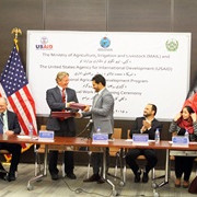 USAID Mission Director Herbie Smith and Minister of Agriculture, Irrigation and Livestock Assadullah Zamir signed an agreement.