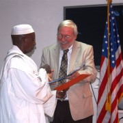 U.S. Ambassador congratulates an awardee