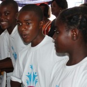 Young students from Lusaka's Chazanga Community celebrate the launch of USAID ZAMFAM