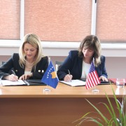 USAID Director Maureen A. Shauket and Minister of Trade and Industry Mimoza Kusari-Lila sign the MOU