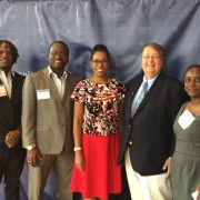 USAID Mission Director Christopher Cushing (second left) is joined by Janelle Lewis, Chloe Noble, Courtney Samuels,  and Pierre 