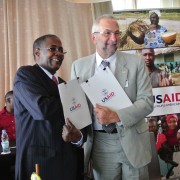 USAID West Africa Regional Mission Director, Alexandre Deprez, and the Executive Secretary of CILSS, Djime Adoum at the signing 